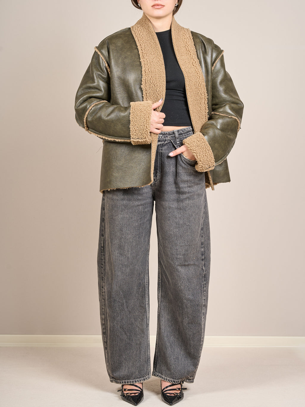 Giacca effetto pelliccia e pelle invecchiata