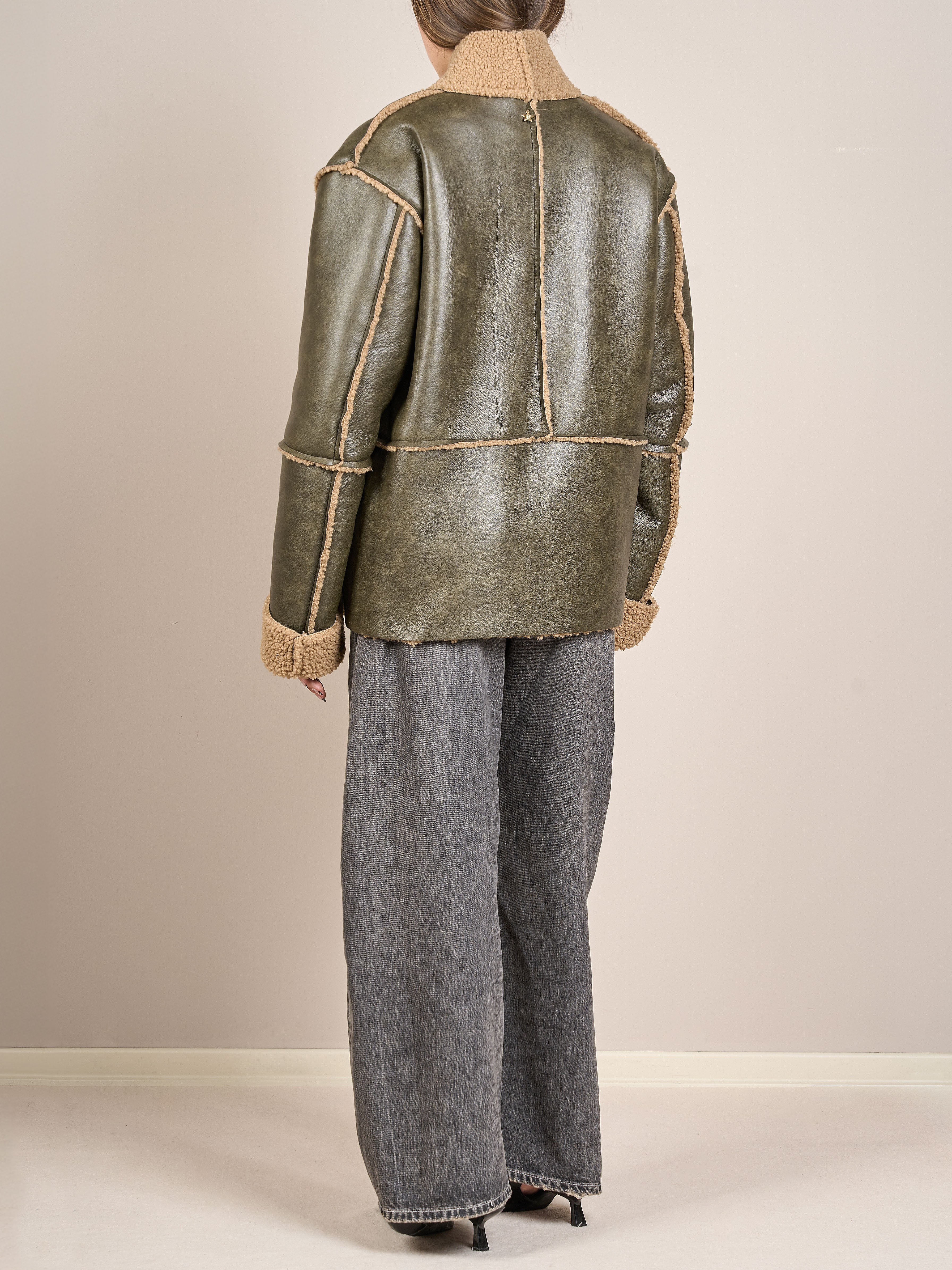 Giacca effetto pelliccia e pelle invecchiata